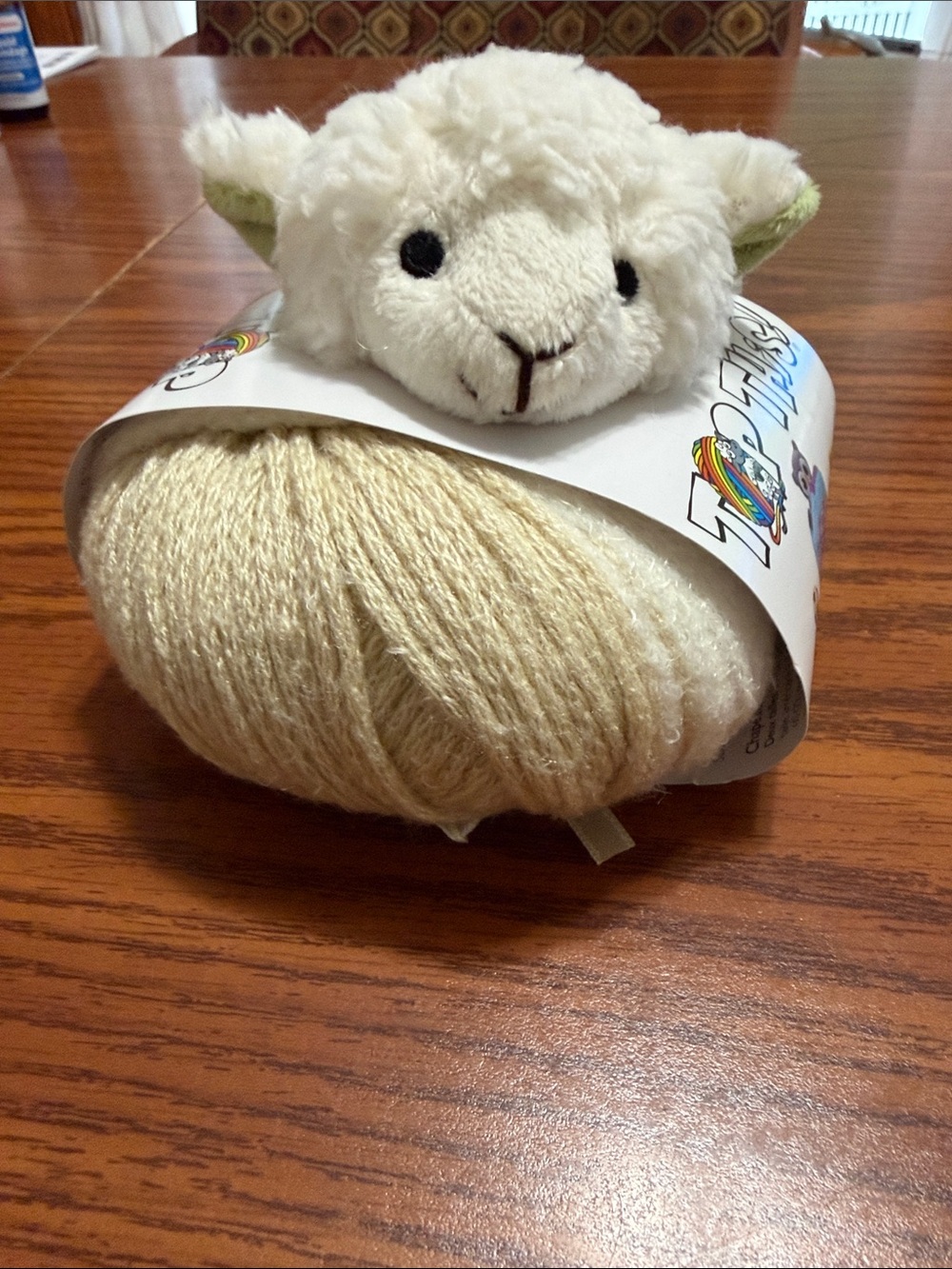Top This DMC Lamb Cap Knitting Kit. Includes yarn, lamb topper, instructions